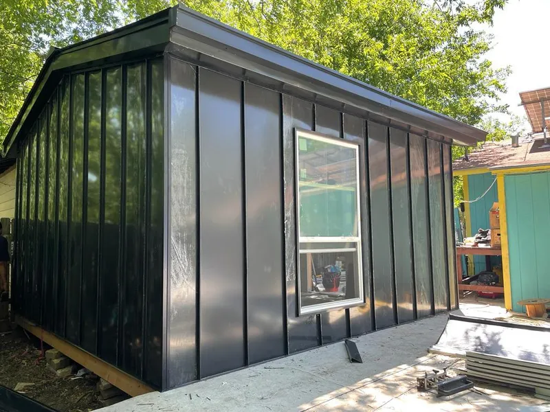 Black standing seam metal wall panels for Roof Inspection in Lewisboro